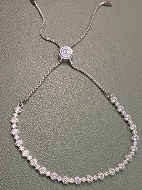 Swarovski adjustable tennis slider bracelet in a silver-tone